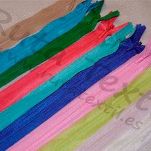 Ruta Textil cremalleras de color